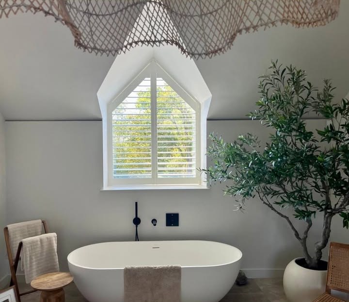 Shaped Bathroom Shutter Installation in Anstey